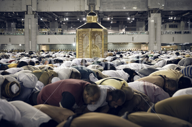 The shrine of our master Abraham, peace be upon him, in Makkah Al-Mukarramah in the Kingdom of Saudi Arabia, pilgrims performing prayers in the Sacred House of God, the rituals of Hajj and Umrah, pilgrims and Umrah performers in the courtyards of the Holy