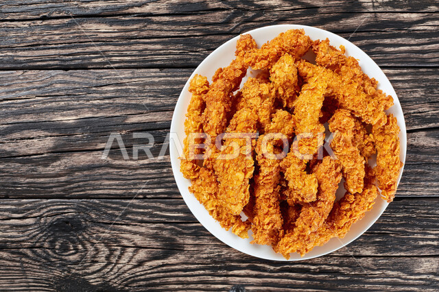 Fast food restaurants, delicious broasted chicken, crispy fried chicken pieces dish, Saudi Arabia food and restaurants, unhealthy meals