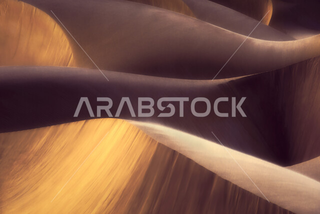 الكثبان الرملية في المناطق الصحراوية في المملكة العربية السعودية، صورة مقربة للتشكيلات الرملية، الرمال الذهبية و التضاريس في الصحارى، البيئة الصحراويه.