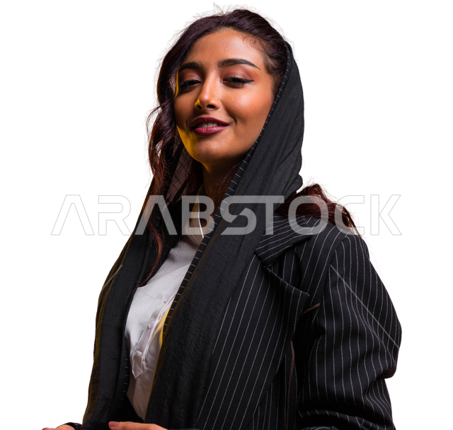 Caring about fashion and keeping up with fashion, following up on matters of beauty and elegance, a close-up portrait of a smiling Saudi Arabian Gulf woman