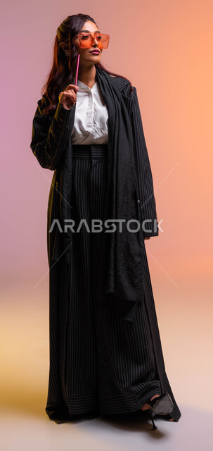 Saudi women's professions and works, an elegant teacher wearing modern  colored sunglasses, a portrait of a