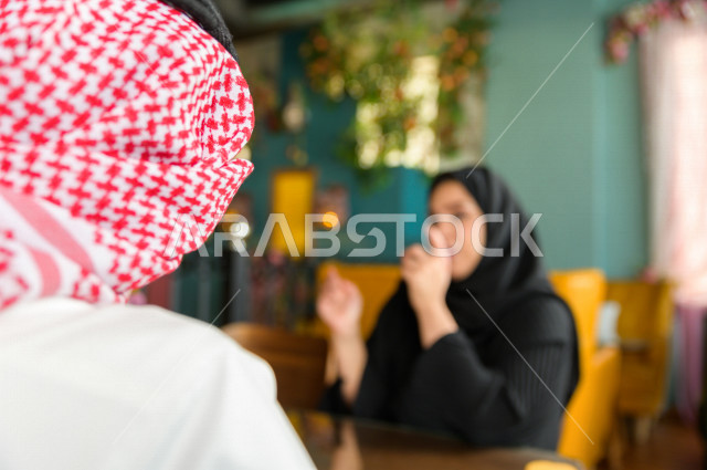 A Saudi Arabian Gulf couple spend a romantic and wonderful atmosphere in the restaurant, celebrate the wedding anniversary, celebrate Valentine's Day, a birthday event, a unique and special session, restaurants and cafes in Saudi Arabia