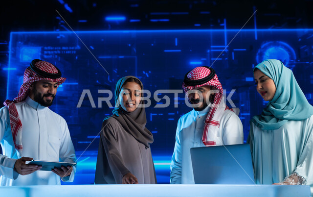 Business dialogues and discussions, financial investment and electronic commerce, development of companies and economic projects, a group of Saudi Gulf Arab employees in a business meeting at the company's headquarters, monitoring the stock market and the