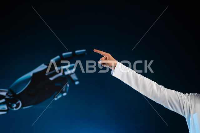 التحول الرقمي والتقدم التقني، تكنولوجيا رؤية مستقبلية سعودية 2030, رجل آلي عصري متطور, بورتريه  مقرب ليد رجل عربي خليجي سعودي تلامس يد روبوت ذكي متطور, برمجة وتحديث تقنية الذكاء الاصطناعي, خلفية زرقاء.