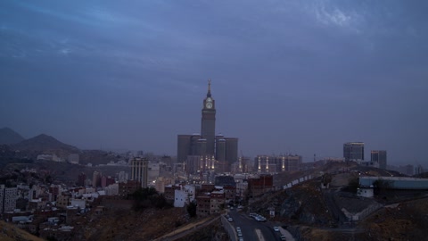 Timelapse of sunset on the Royal Clock Tower in the Holy Mosque in Mecca