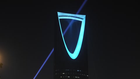 Kingdom Tower Illuminated at Night in Riyadh KSA