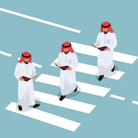 Practicing the hobby of reading and literature, Gulf Arab Saudi men wearing traditional attire are sitting and reading a book, immersed in reading while walking.