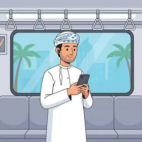 Going to work by train, an Arab Gulf Omani man wearing traditional attire is using a mobile phone, utilizing a modern and advanced technological means.
