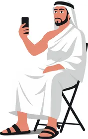 رجل مسلم بملابس الإحرام يجلس مع هاتف ذكي رسم فيكتور