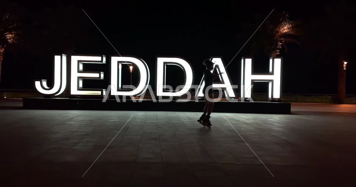 Spending fun times, a Saudi Arab Gulf youth wearing roller skates in