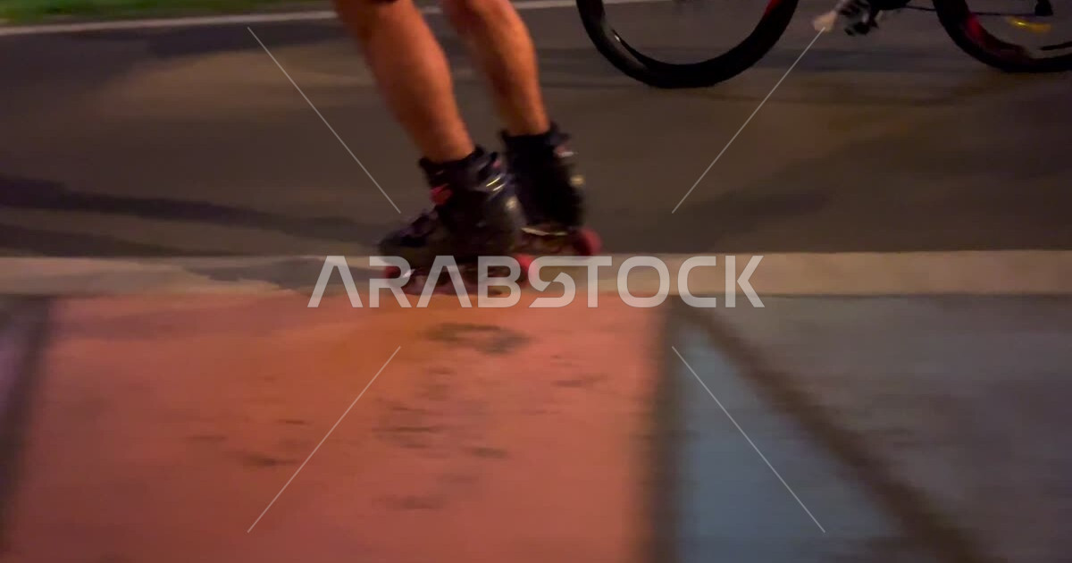 A closeup of a Saudi Arabian Gulf youth wearing roller skates and