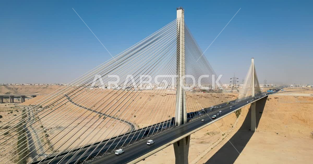 Drone photography of the Wadi Laban bridge supported by cables, the