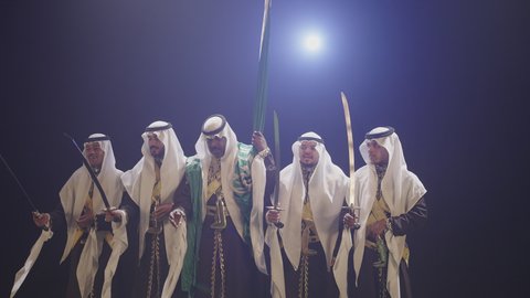 Saudi National Day Folk Dancing With Swords In The Najdi Ardha 