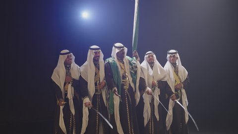 Folk Dancing With Swords In The Najdi Ardha Wearing The Folk Costume 