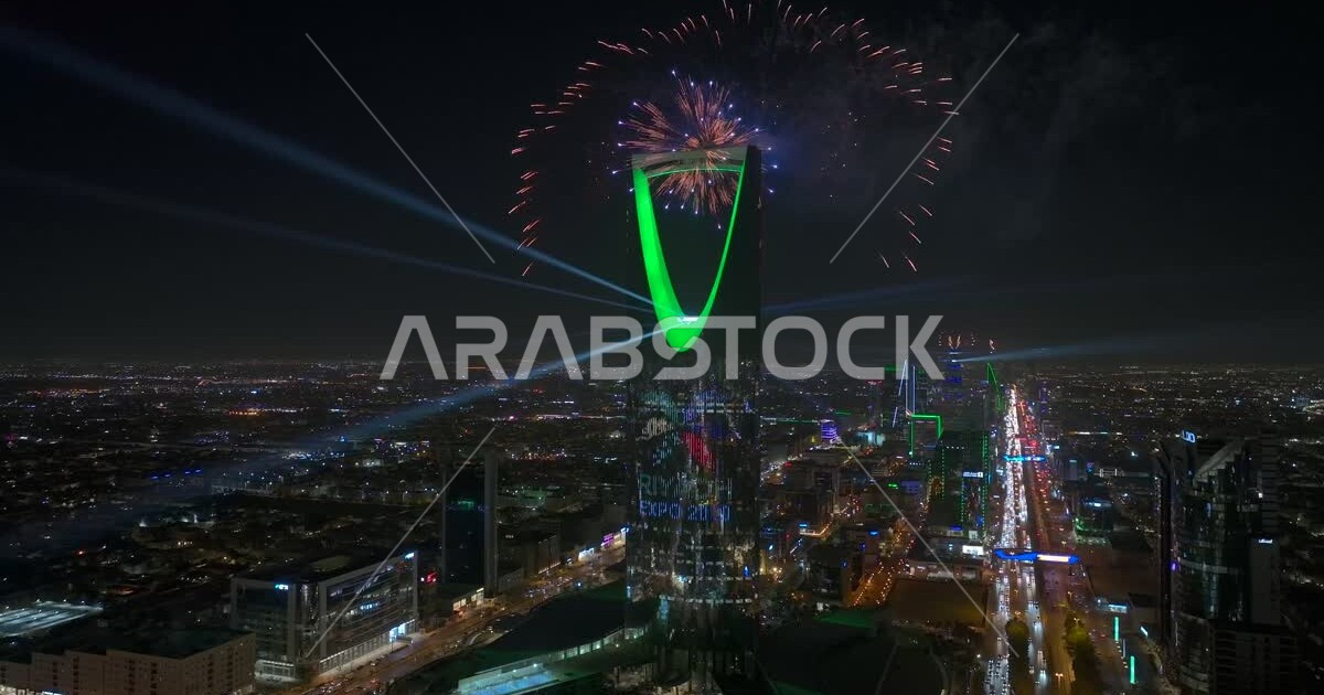 Illuminating towers and skyscrapers, the reflection of the Expo logo on