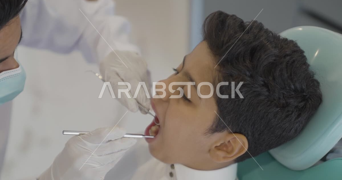 Installing dental fillings and treating oral diseases, a Saudi Arabian