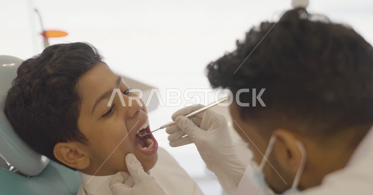 Treating oral diseases and installing dental fillings, a Saudi Arabian