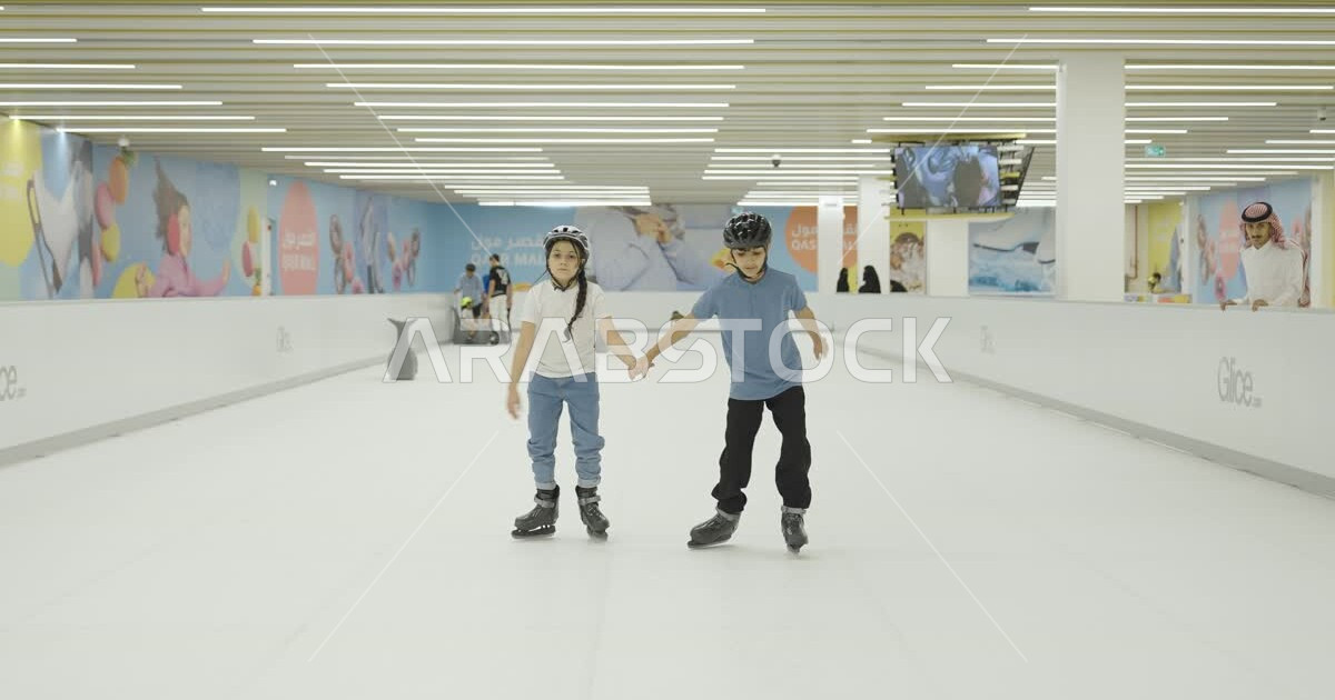 Ice skating in luxury malls in Riyadh, playing in indoor skating