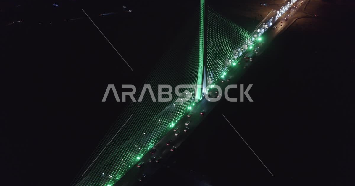 Traffic and cars at night, aerial drone photography of the cable-stayed ...