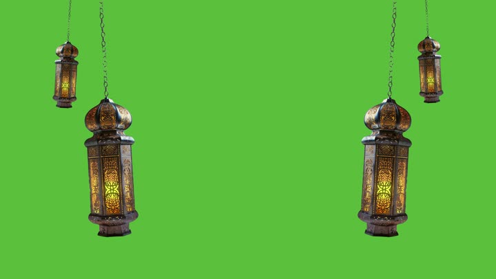 A group of traditional hanging metal lamps decorated with Arabic motifs, welcoming the holy month, Islamic religious backgrounds, the spiritual Ramadan atmosphere, celebrating holidays and events, lanterns, ornaments and decorations for the blessed Ramadan, green background, chroma