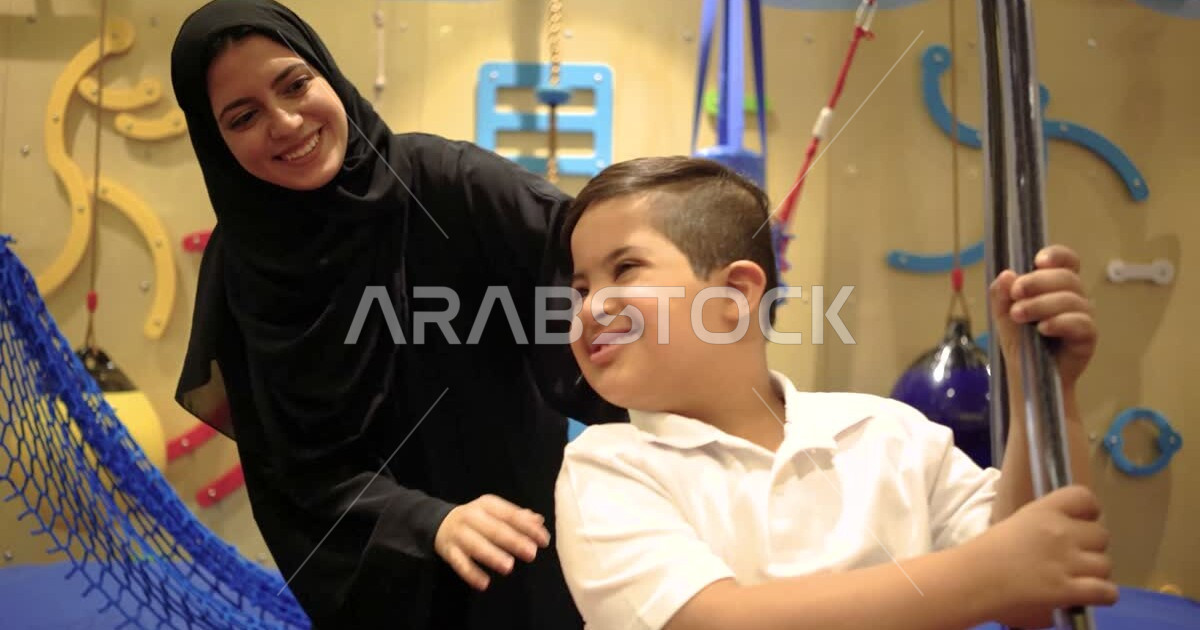 A Saudi Arabian kindergarten teacher specializing in caring for ...