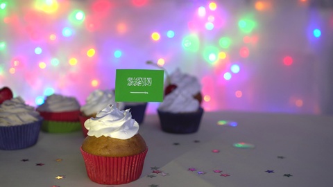 Cupcake with Saudi Arabia flag. Saudi National Day. Patriotic holiday