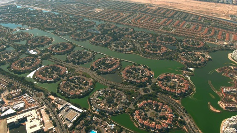 Aerial view of luxury Jumeirah Islands and Jumeirah Park communities in Dubai