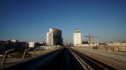 Modern cityscape view by metro in Dubai, UAE