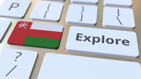 EXPLORE word and national flag of Oman on the buttons of the keyboard. 3D