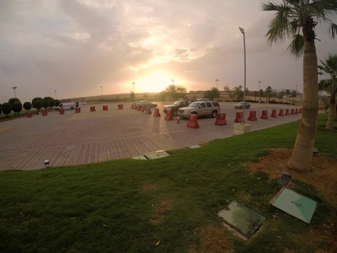 Time lapse of the parking garage in front of King Fahd Cultural Center in Riyadh during the day, the modern and advanced architectural style of building towers and skyscrapers in the Kingdom of Saudi Arabia, famous cultural landmarks and tourist places