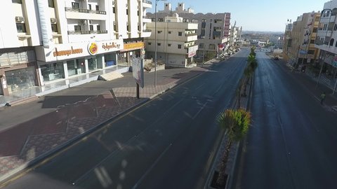 Transportation and communication in tourist cities, aerial drone photography of the Abha city road in the Kingdom of Saudi Arabia, the growth and development of infrastructure in the Asir region, and the architectural art of towers and residential and commercial buildings.