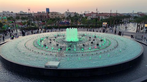 Focus on the agricultural engineering of trees and green plants in tourist areas, the engineering design of roads and streets in Saudi Arabia, famous landmarks to attract tourists on the Jeddah Corniche, and aerial drone photography of Prince Majed Park in Jeddah.