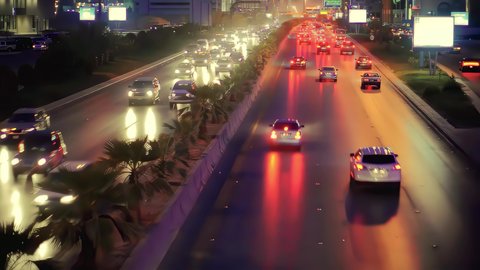 Traffic and transportation at night, aerial drone footage of King Fahd Road in the capital of Saudi Arabia, the growth and development of infrastructure in Riyadh, and the architectural art of towers, residential and commercial buildings.