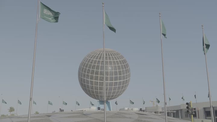 Globe Square in Jeddah, famous landmarks of Jeddah, traffic congestion during the day, car traffic in the city, development of roads and streets in the country, urban expansion and development in the Kingdom of Saudi Arabia