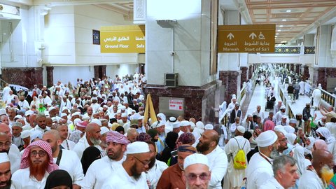 Pilgrims of the House of God during the Sa'i between Safa and Marwa, performing brisk walking, worship and drawing closer to God, sacred Islamic religious sites in Mecca, performing Hajj and Umrah rituals in the Kingdom of Saudi Arabia