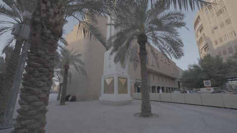 Al-Safa Clock in the Government Palace Square in Riyadh during the day, famous historical heritage tourist sites, ancient monuments in the Kingdom of Saudi Arabia, the concept of ancient civilizations, interest in planting trees and green plants in tourist cities