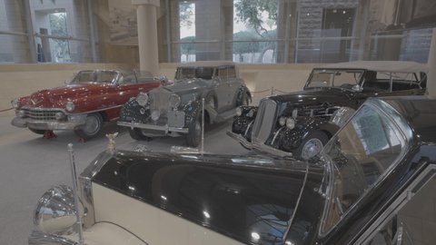 Antique car showroom inside the historic Al-Murabba Palace in Riyadh, authenticity, authenticity and adherence to Saudi heritage, famous landmarks and tourist sites, design and architectural art of old-style mud buildings, historical sites in the Kingdom of Saudi Arabia