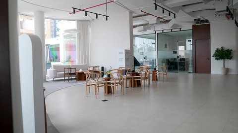 Interior designs and elegant decorations in a modern style, modern office setups with stylish and comfortable furniture, contemporary design for offices of companies in the Kingdom of Saudi Arabia, large glass facades in the workplace.