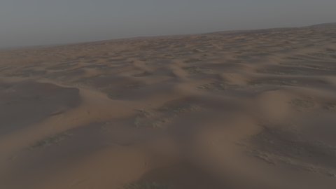 Sand dunes and hills in Saudi Arabia, aerial drone footage of the soft golden sands of Al Thumama, desert terrain and natural environment, desert outings and recreational activities, nature background