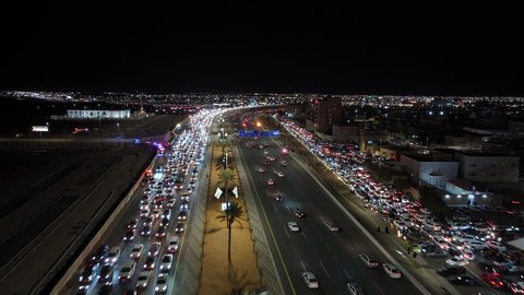 Traffic and cars on King Fahd Road, drone aerial photography of the streets of Riyadh in the Kingdom of Saudi Arabia, top view of car traffic on the public road, traffic congestion in the streets of Saudi Arabia