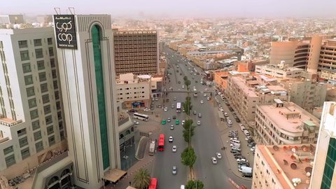 Stunning aerial footage of Al Malaz District, one of Riyadh's most famous and historic neighborhoods in Saudi Arabia. Captured in professional 4K resolution using drone technology, showcasing parks, busy streets, residential buildings, government facilities, and green areas at the heart of the capital.