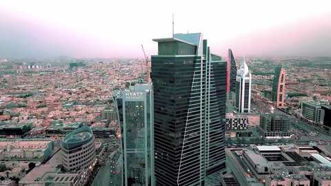 Architectural engineering art of towers and skyscrapers, urban expansion and development of commercial and residential buildings, interest in the roads and streets of the Kingdom of Saudi Arabia, aerial drone photography of Al-Olaya Towers on King Fahd Road in Riyadh