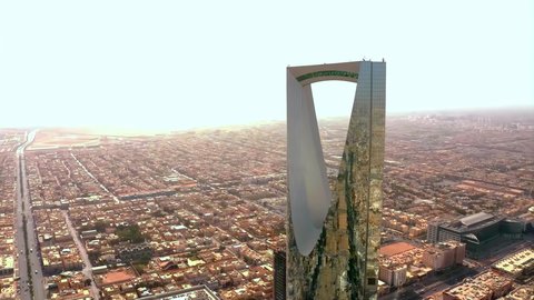 Towers and skyscrapers, growth, development and urban progress, lifestyle in the capital, famous buildings and landmarks in Saudi Arabia, advanced and modern architectural art, aerial photography of the famous Kingdom Tower in Riyadh