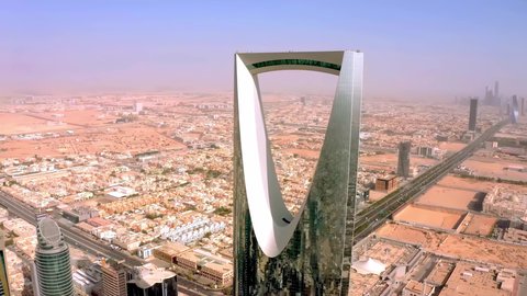 Towers and skyscrapers, growth, development and urban progress, lifestyle in the capital, famous buildings and landmarks in Saudi Arabia, advanced and modern architectural art, aerial photography of the famous Kingdom Tower in Riyadh