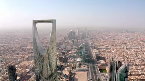 Towers and skyscrapers, growth, development and urban progress, lifestyle in the capital, famous buildings and landmarks in Saudi Arabia, advanced and modern architectural art, aerial photography of the famous Kingdom Tower in Riyadh