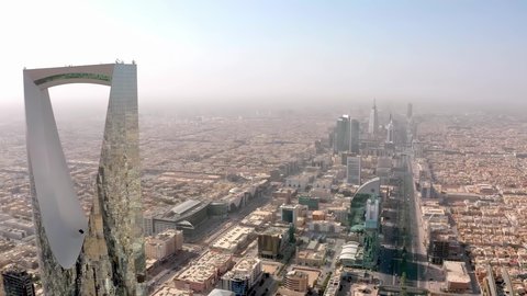 Towers and skyscrapers, growth, development and urban progress, lifestyle in the capital, famous buildings and landmarks in Saudi Arabia, advanced and modern architectural art, aerial photography of the famous Kingdom Tower in Riyadh