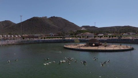 Gardens and recreational parks in the Kingdom of Saudi Arabia, vast green spaces, a famous natural landmark and tourist site, entertainment, fun and amusement games for children in one of the parks of Hail City, a family entertainment park