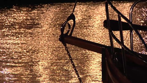 A trip in a traditional wooden boat, a close-up of the sail of the sea fishing boats extracting natural pearls from the sea, ancient popular crafts and professions in the United Arab Emirates, deep-sea sailing, pearl diving trips