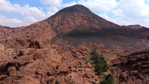 Mountains and rock formations in the desert regions of the Kingdom of Saudi Arabia, an ancient historical archaeological site, terrain, peaks and mountain heights in the desert, drone photography of mountains in the city of Hail
