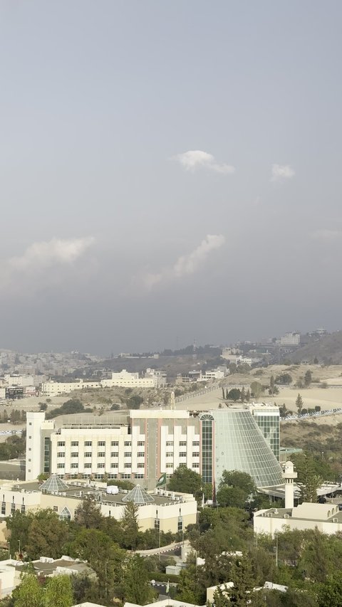 Abha mountain ranges, rugged terrain and stone roads, aerial photography of the mountainous environment in the Asir region, green nature, beautiful parks and gardens, trees and plants on the mountain slopes